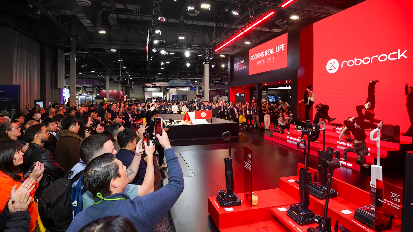 Roborock CES 2026 booth with residential product demonstration environments and visitor traffic