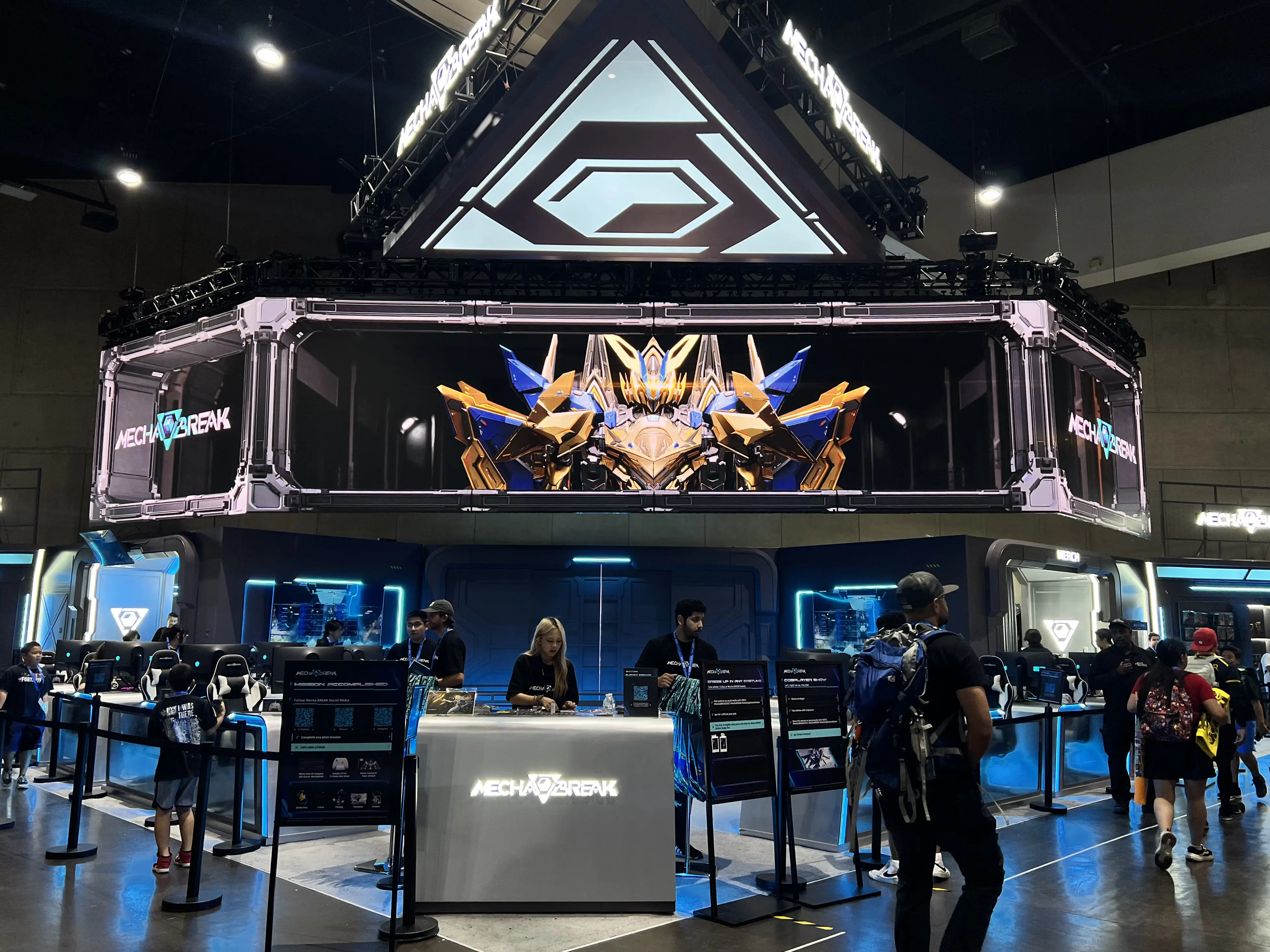 SDCC 2025 San Diego Comic Con MechaBreak Game booth: robots on the screen and metal& future style booth design