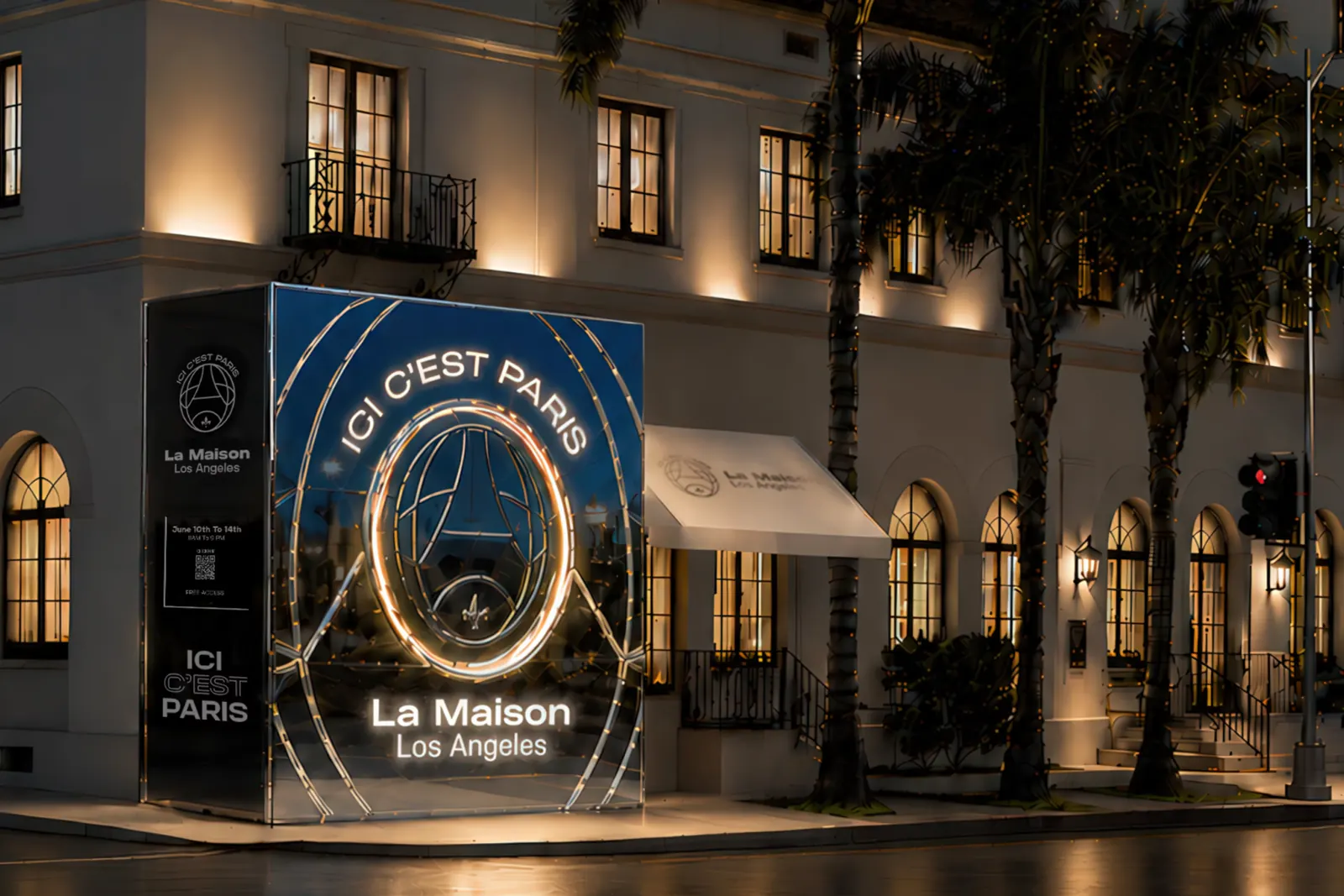 Illuminated Ici C'est Paris – La Maison entrance cube with a glowing Paris
Saint-Germain crest, installed at night outside the Hollywood Athletic Club
in Los Angeles
